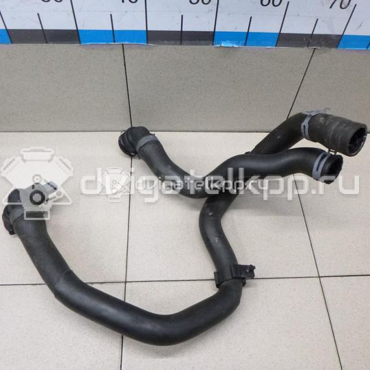 Фото Патрубок радиатора  5Q0121049AD для Seat Leon