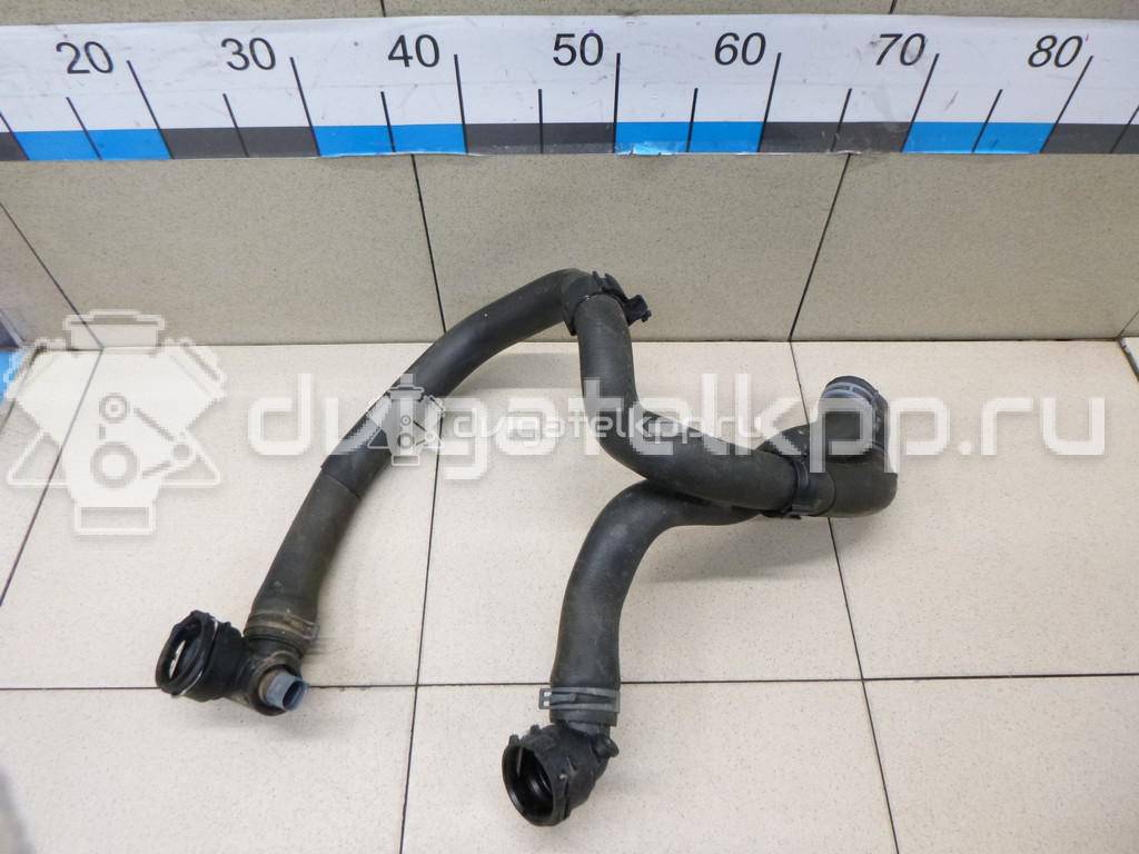 Фото Патрубок радиатора  5Q0121049AD для Seat Leon {forloop.counter}}
