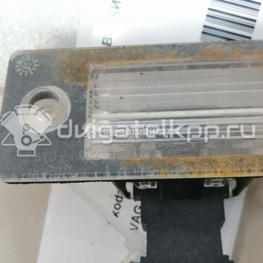 Фото Фонарь подсветки номера  6Y0943021E для Skoda Fabia / Yeti 5L