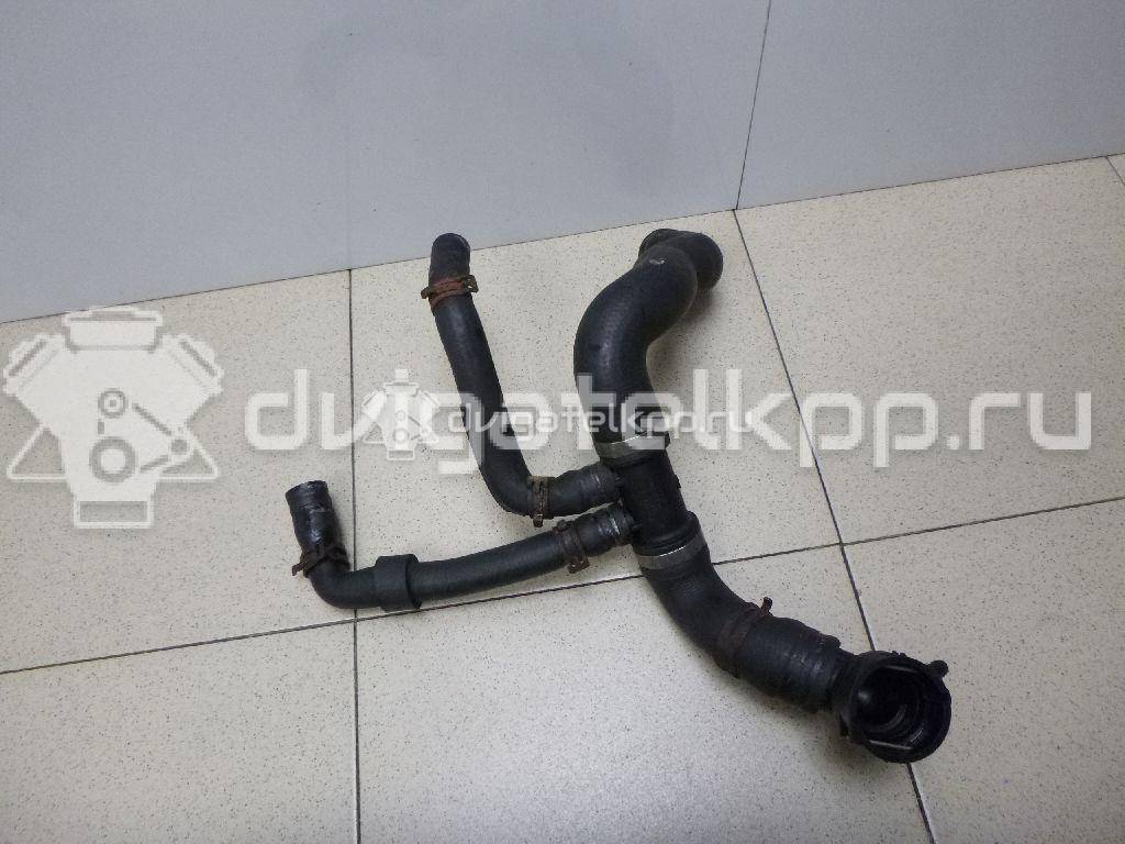 Фото Патрубок радиатора  1K0121156CE для Volkswagen Scirocco / Touran / Eos 1F7, 1F8 / Golf / Beetle {forloop.counter}}