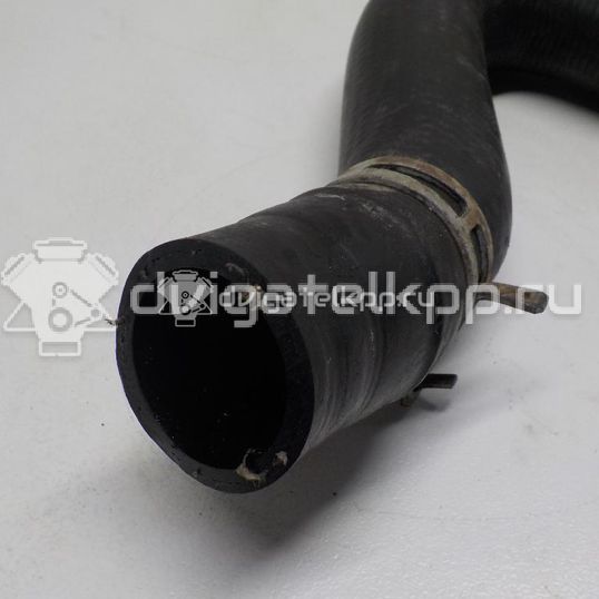 Фото Патрубок радиатора  357121051B для Volkswagen Passat / Jetta / Golf