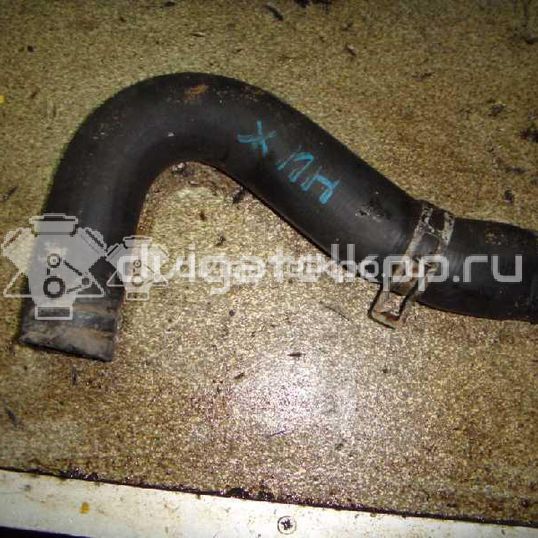 Фото Патрубок радиатора  357121051B для Volkswagen Passat / Jetta / Golf