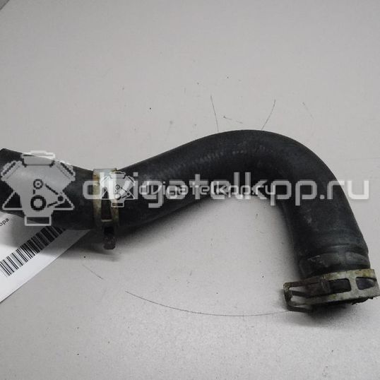 Фото Патрубок радиатора  357121051B для Volkswagen Passat / Jetta / Golf