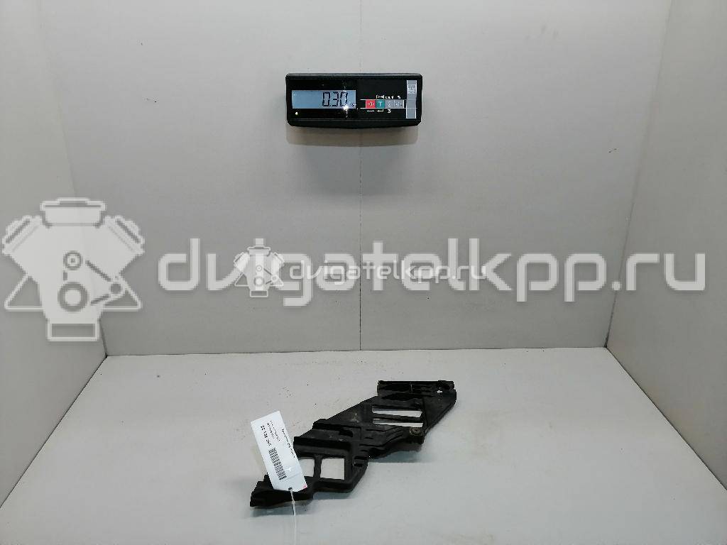 Фото Кронштейн фар правый  5K0807228A для Volkswagen Touran / Jetta / Golf {forloop.counter}}