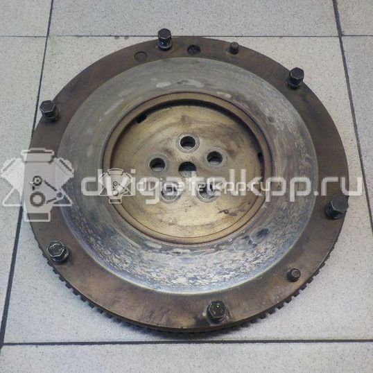 Фото Маховик для двигателя G4ED для Hyundai / Kia 105-112 л.с 16V 1.6 л бензин 2320026100