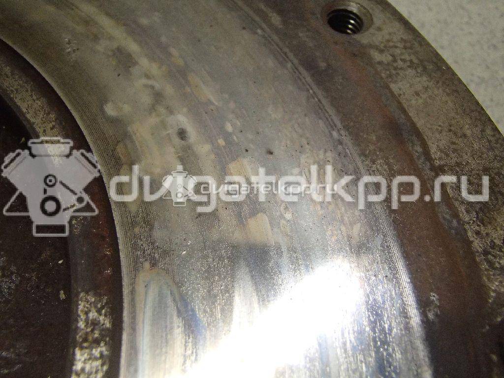 Фото Маховик для двигателя G4EE для Kia Rio / Pride 97 л.с 16V 1.4 л бензин 2320026101 {forloop.counter}}