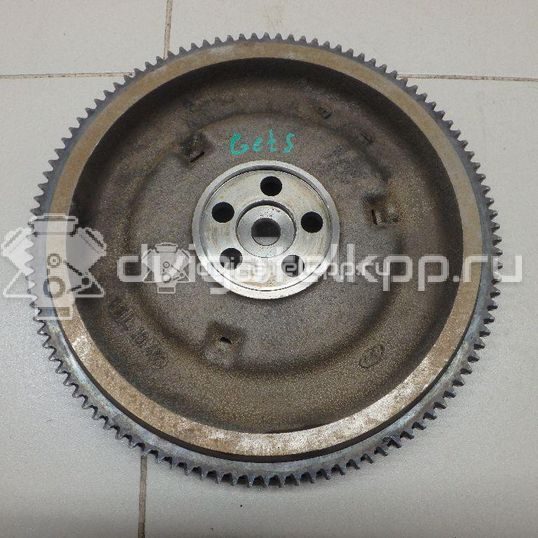 Фото Маховик для двигателя G4EE для Kia Rio / Pride 97 л.с 16V 1.4 л бензин 2320026101