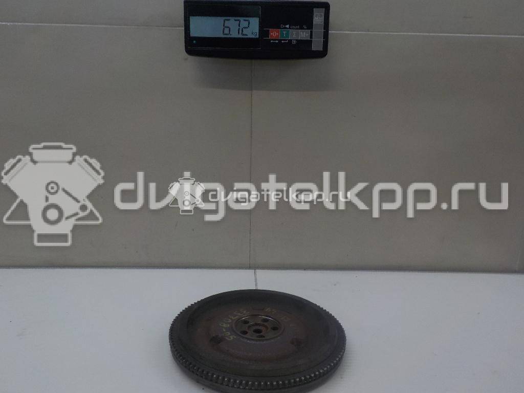 Фото Маховик для двигателя G4EE для Kia Rio / Pride 97 л.с 16V 1.4 л бензин 2320026101 {forloop.counter}}