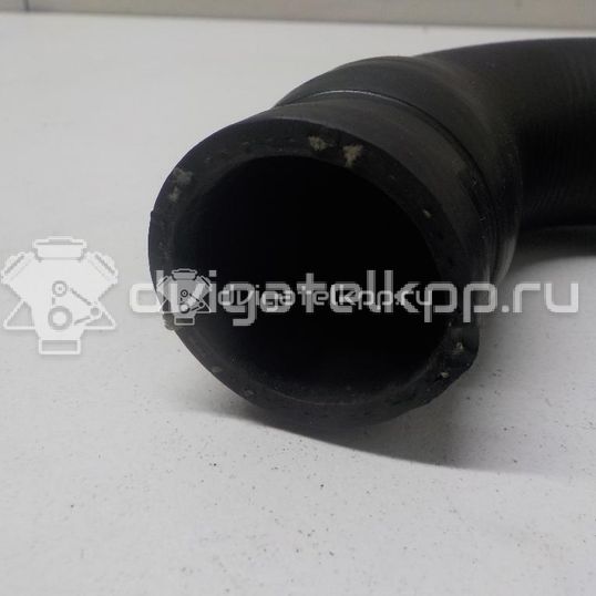 Фото Патрубок радиатора  8D0121101Q для vw Passat [B5]