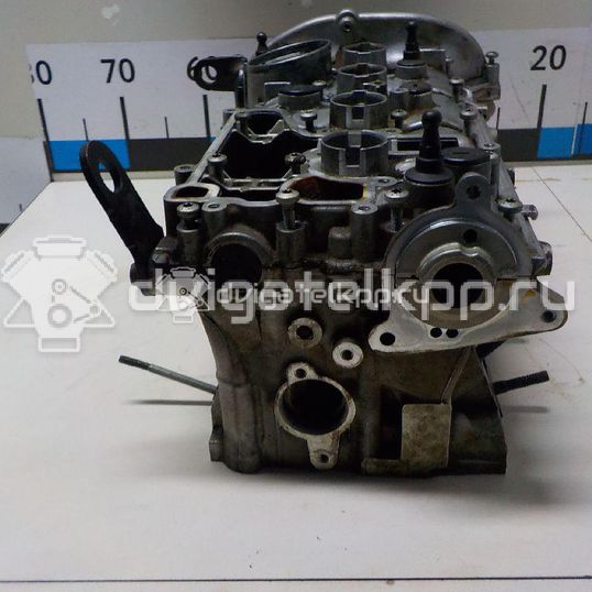 Фото Головка блока  06H103064AB для Volkswagen Passat / Cc