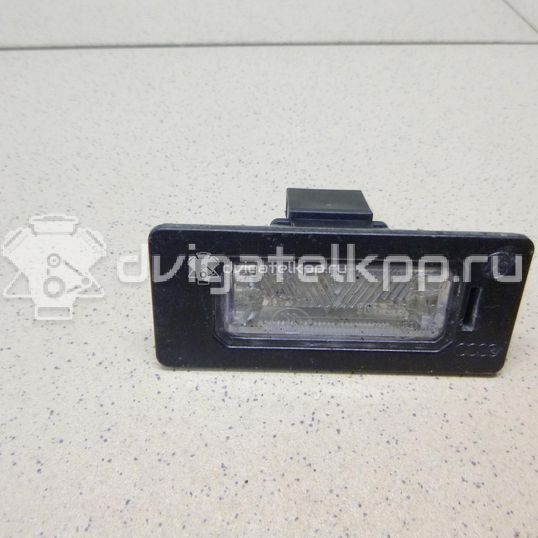 Фото Фонарь подсветки номера  8T0943021 для vw Passat [B6]