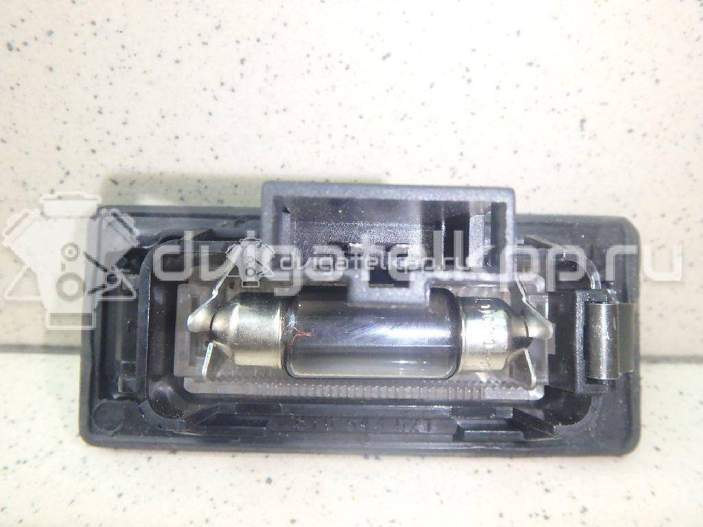 Фото Фонарь подсветки номера  8T0943021 для vw Passat [B6] {forloop.counter}}