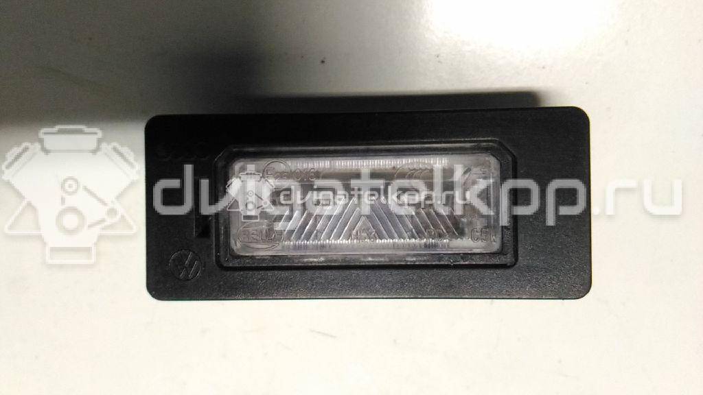 Фото Фонарь подсветки номера  8T0943021 для vw Passat [B6] {forloop.counter}}