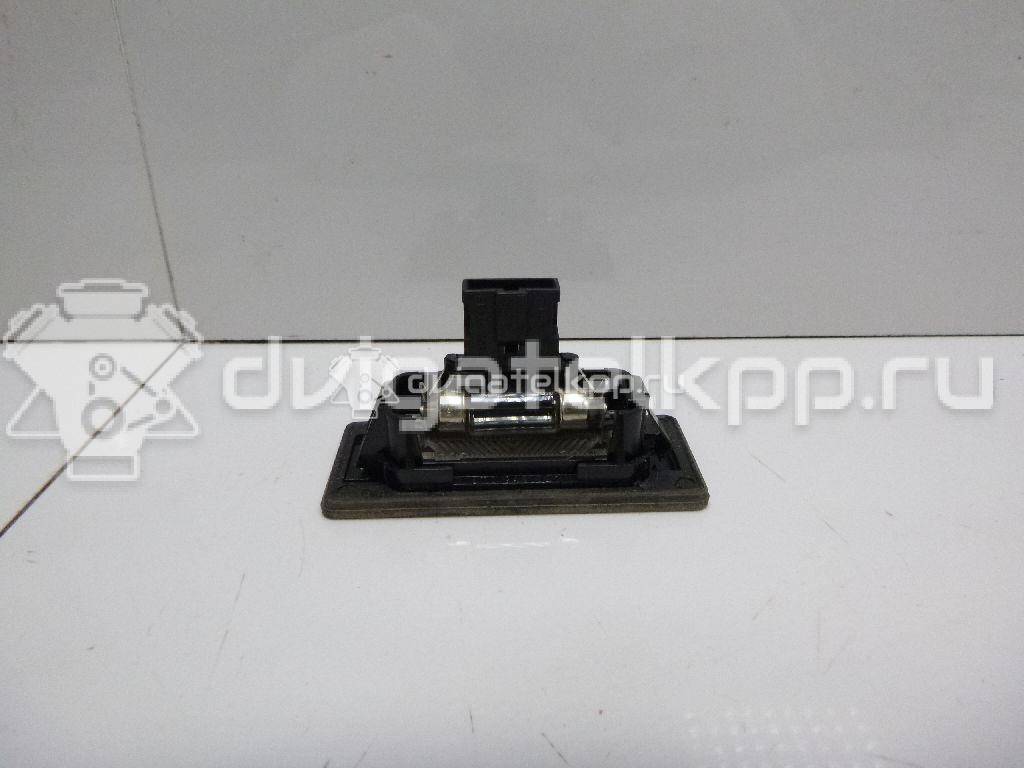 Фото Фонарь подсветки номера  8T0943021 для vw Passat [B6] {forloop.counter}}