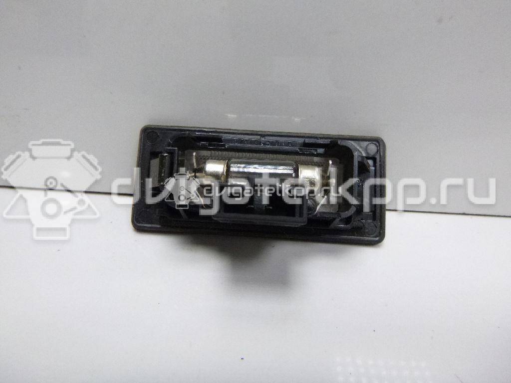 Фото Фонарь подсветки номера  8T0943021 для vw Passat [B6] {forloop.counter}}