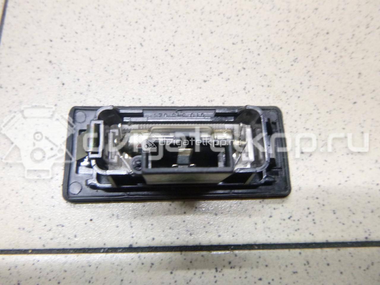 Фото Фонарь подсветки номера  8T0943021 для vw Passat [B6] {forloop.counter}}