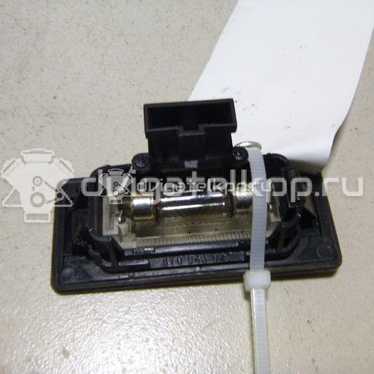 Фото Фонарь подсветки номера  8T0943021 для vw Passat [B6]