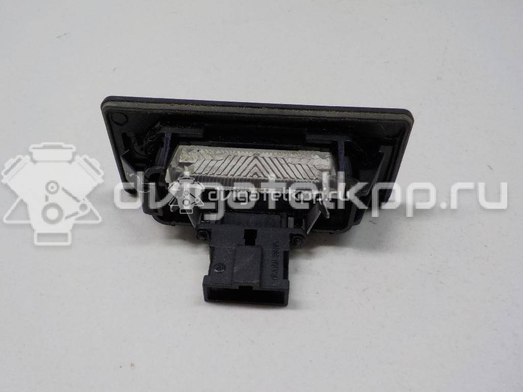 Фото Фонарь подсветки номера  8T0943021 для vw Passat [B6] {forloop.counter}}