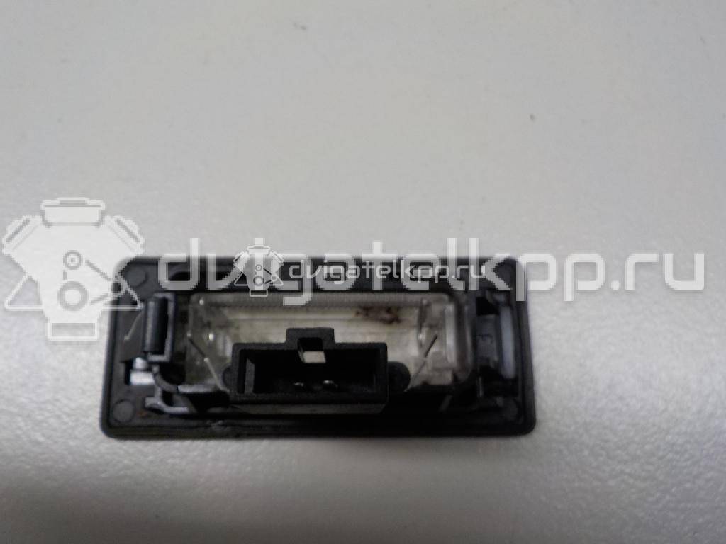 Фото Фонарь подсветки номера  8T0943021 для vw Passat [B6] {forloop.counter}}