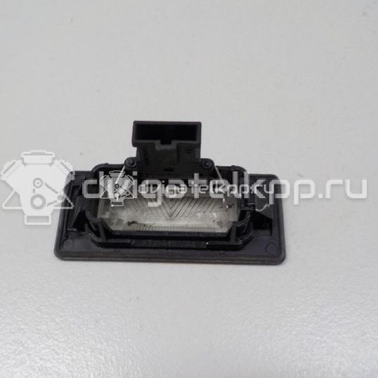 Фото Фонарь подсветки номера  8T0943021 для vw Passat [B6]