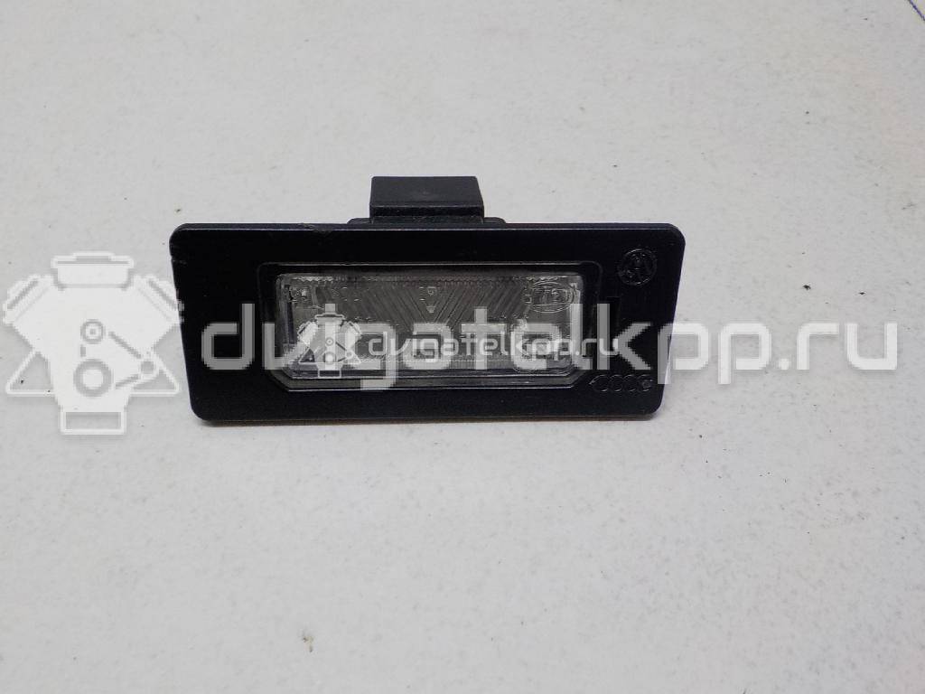 Фото Фонарь подсветки номера  8T0943021 для vw Passat [B6] {forloop.counter}}