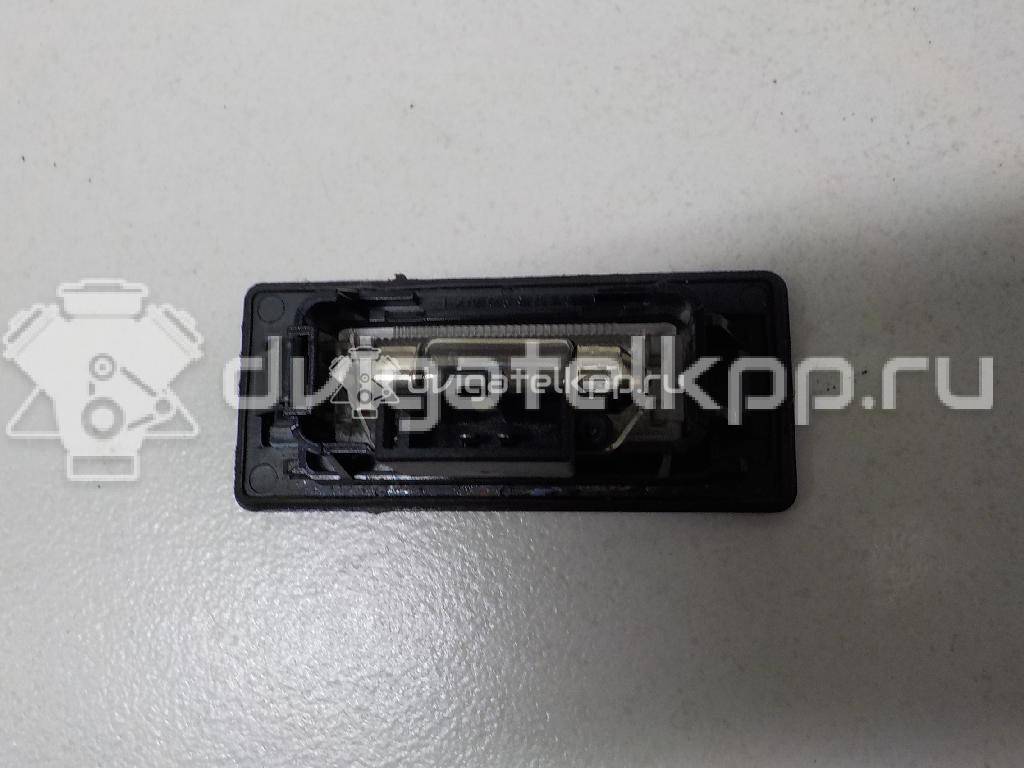 Фото Фонарь подсветки номера  8T0943021 для vw Passat [B6] {forloop.counter}}