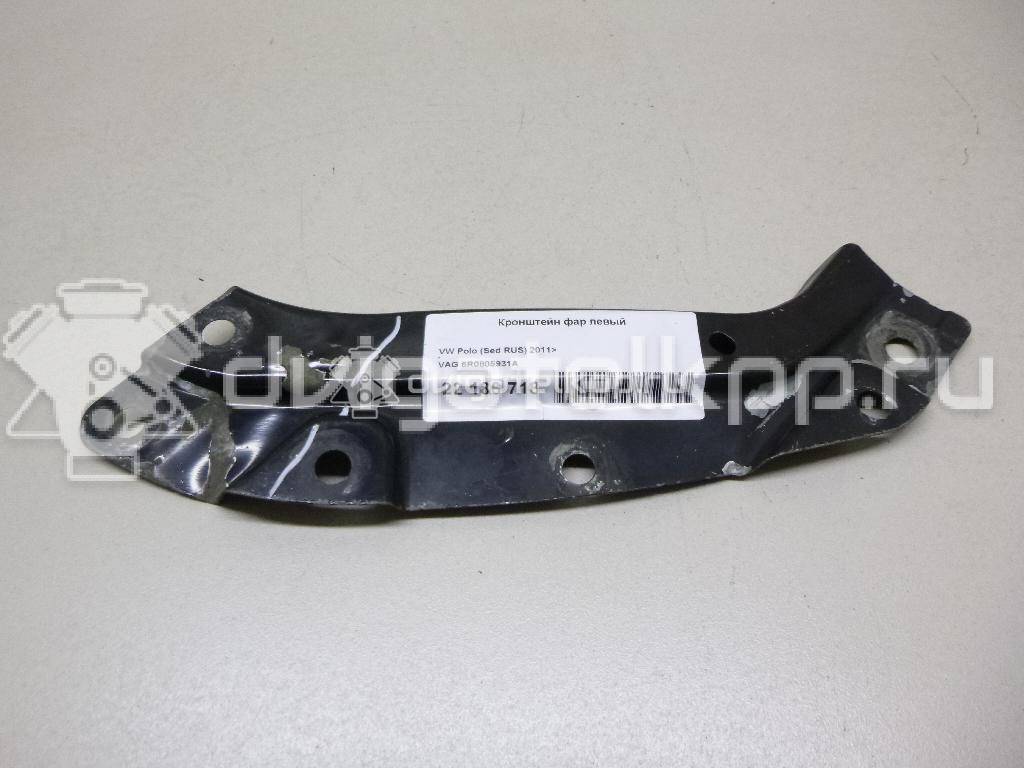 Фото Кронштейн фар левый  6R0805931A для Volkswagen Polo / Jetta {forloop.counter}}