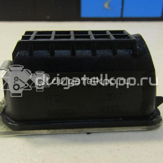 Фото Фонарь подсветки номера  6m2a13550ab для ford C-MAX