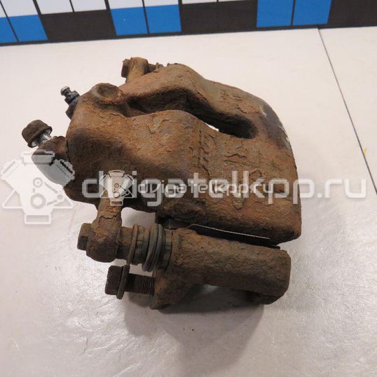 Фото Суппорт тормозной передний левый  5512079J10 для Suzuki Sx4