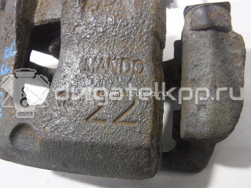 Фото Суппорт тормозной передний правый  581304L000 для Kia Rio {forloop.counter}}