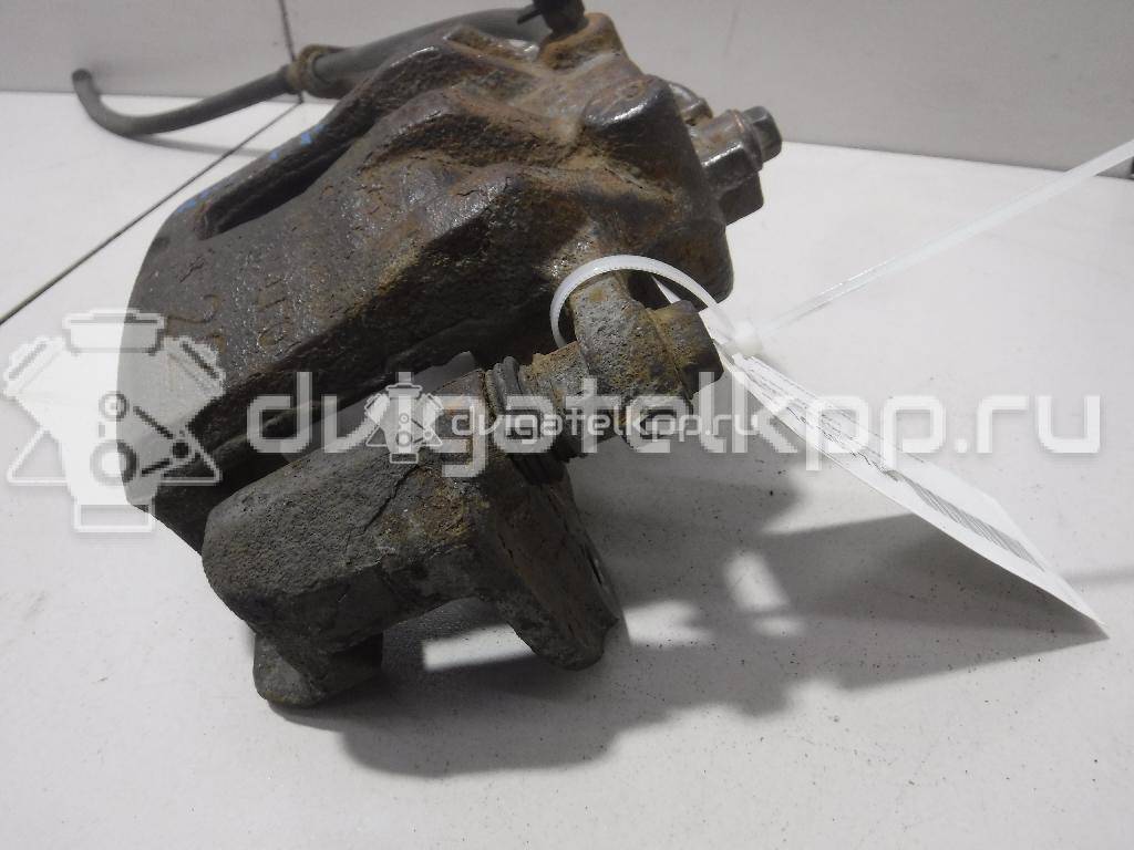 Фото Суппорт тормозной передний правый  581304L000 для Kia Rio {forloop.counter}}