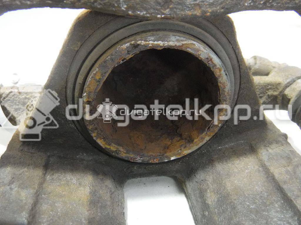 Фото Суппорт тормозной передний правый  581304L000 для Kia Rio {forloop.counter}}
