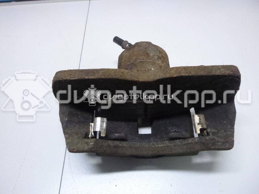 Фото Суппорт тормозной передний левый  K0BB149990 для Kia Rio / Shuma Fb {forloop.counter}}