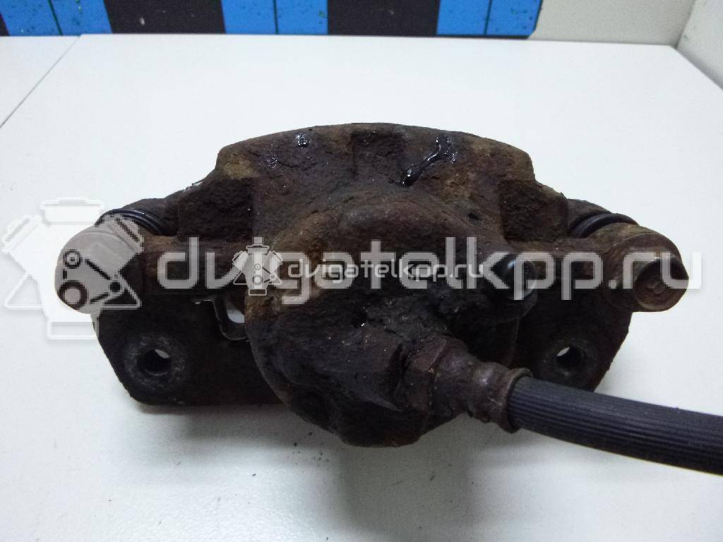 Фото Суппорт тормозной передний правый  K0BB149980 для Kia Rio / Shuma Fb {forloop.counter}}