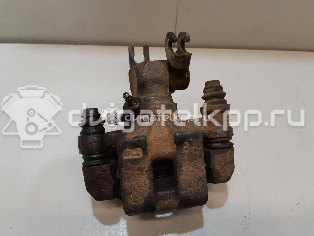 Фото Суппорт тормозной задний левый  0K2N349990 для Kia Shuma Fb / Carens / Sephia Fa / Clarus {forloop.counter}}