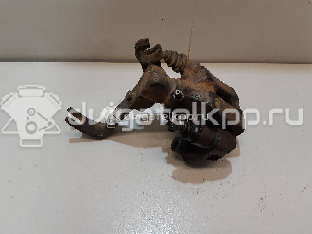 Фото Суппорт тормозной задний левый  0K2N349990 для Kia Shuma Fb / Carens / Sephia Fa / Clarus {forloop.counter}}