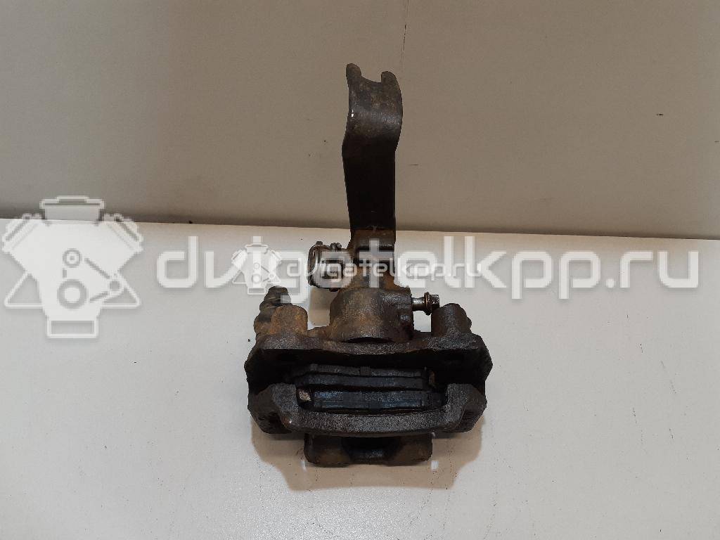 Фото Суппорт тормозной задний левый  0K2N349990 для Kia Shuma Fb / Carens / Sephia Fa / Clarus {forloop.counter}}