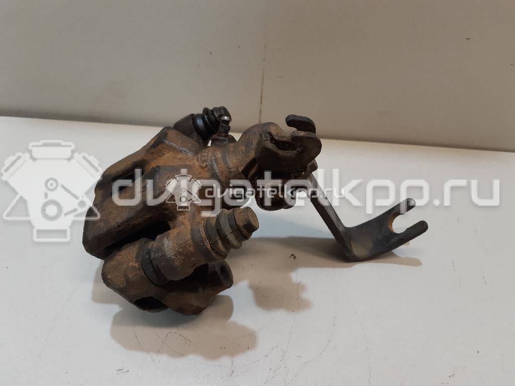 Фото Суппорт тормозной задний левый  0K2N349990 для Kia Shuma Fb / Carens / Sephia Fa / Clarus {forloop.counter}}