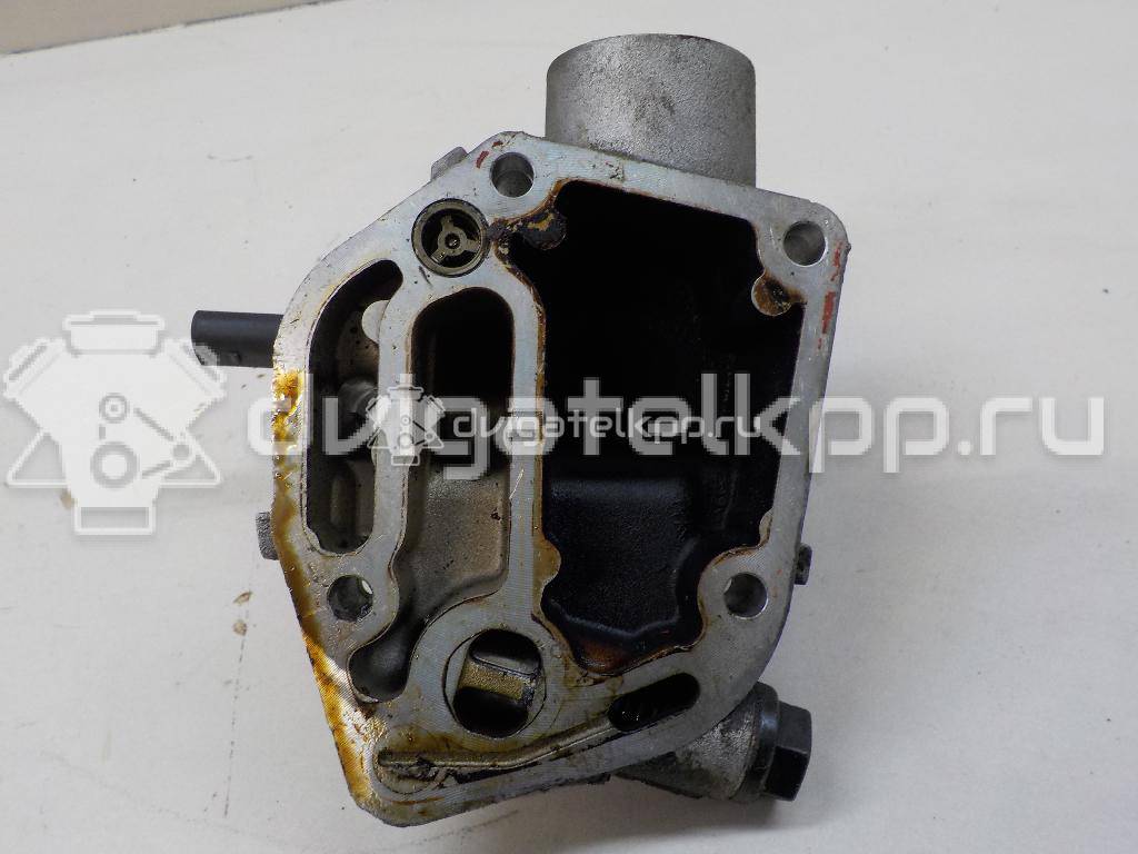 Фото Кронштейн масляного фильтра для двигателя AWM для Volkswagen / Audi 170 л.с 20V 1.8 л бензин 06A115417 {forloop.counter}}