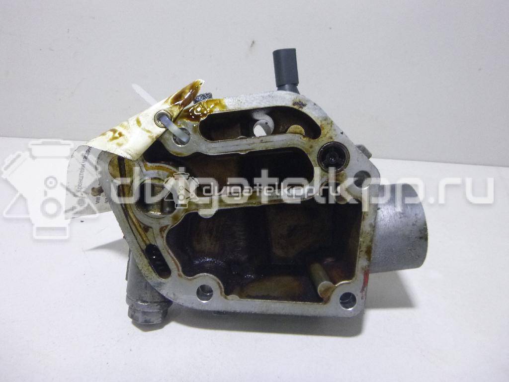 Фото Кронштейн масляного фильтра для двигателя AWM для Volkswagen / Audi 170 л.с 20V 1.8 л бензин 06A115417 {forloop.counter}}