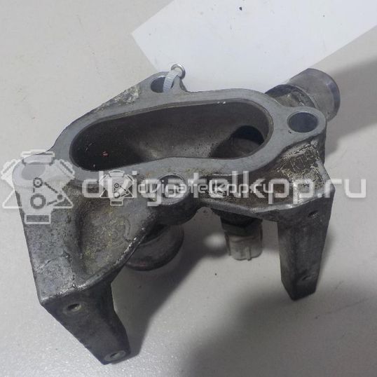 Фото Фланец двигателя системы охлаждения  1221325 для Ford Fiesta / Focus / Puma Ec