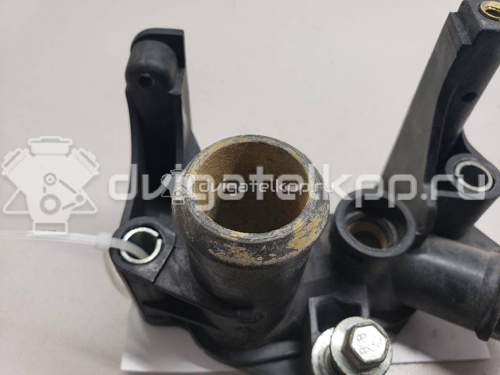 Фото Фланец двигателя системы охлаждения  1221325 для Ford Fiesta / Focus / Puma Ec {forloop.counter}}