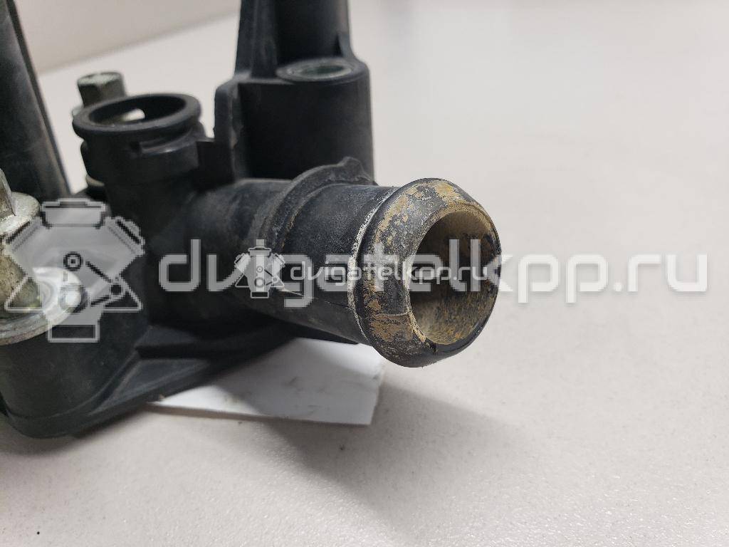 Фото Фланец двигателя системы охлаждения  1221325 для Ford Fiesta / Focus / Puma Ec {forloop.counter}}