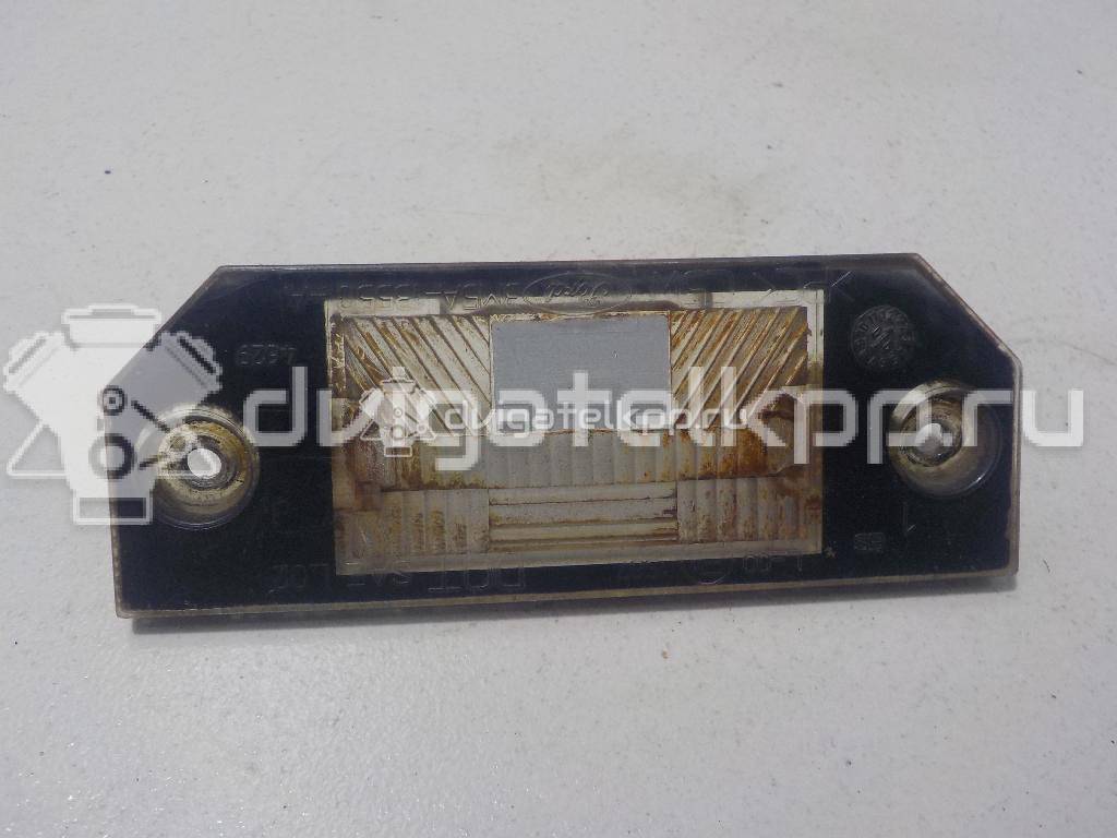 Фото Фонарь подсветки номера  4502331 для Ford Focus / C-Max {forloop.counter}}