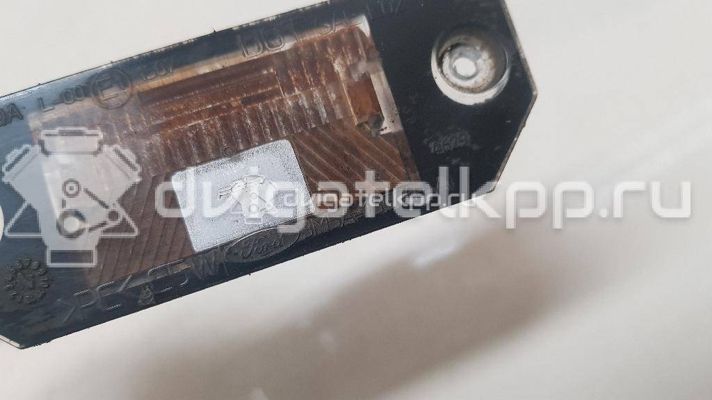Фото Фонарь подсветки номера  4502331 для Ford Focus / C-Max {forloop.counter}}