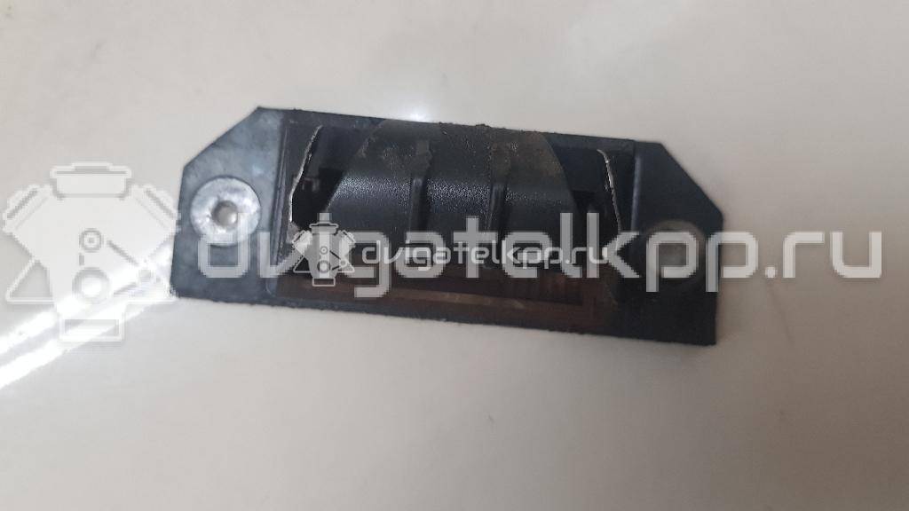 Фото Фонарь подсветки номера  4502331 для Ford Focus / C-Max {forloop.counter}}