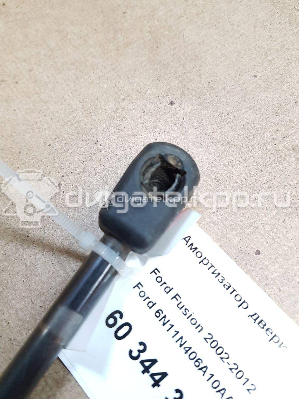 Фото Амортизатор двери багажника  6N11N406A10AA для Ford Fusion Ju {forloop.counter}}