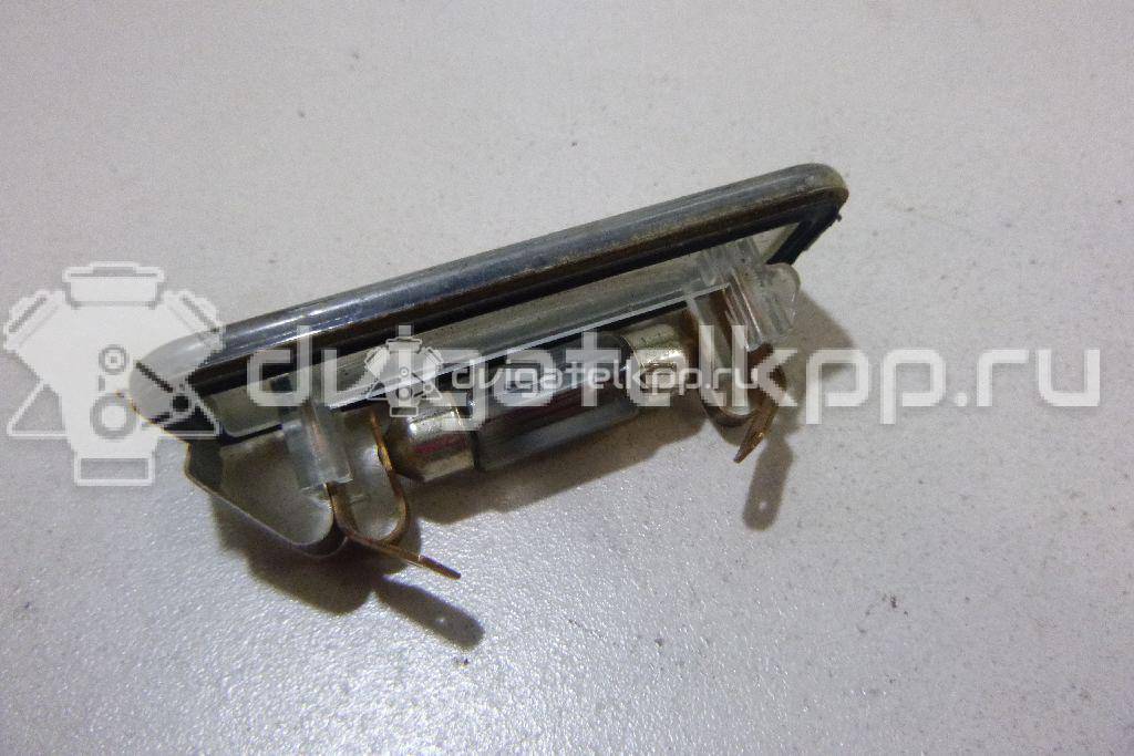 Фото Фонарь подсветки номера  XS4X13550AB для Ford Focus {forloop.counter}}