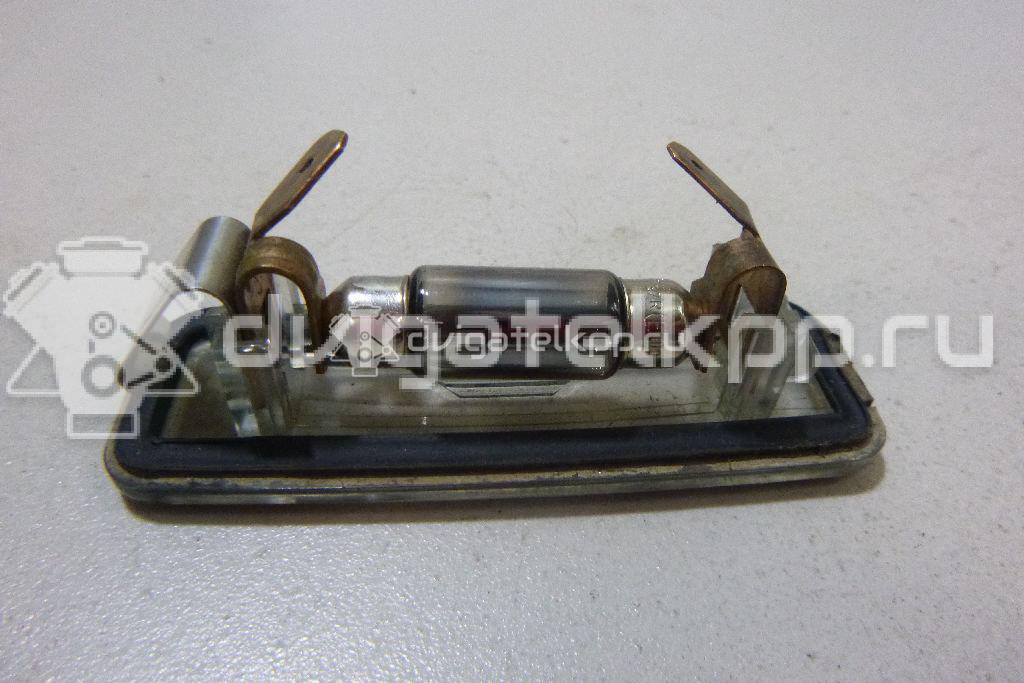 Фото Фонарь подсветки номера  XS4X13550AB для Ford Focus {forloop.counter}}