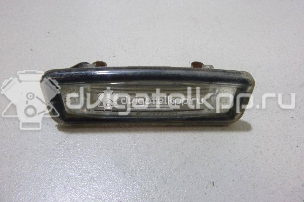 Фото Фонарь подсветки номера  XS4X13550AB для Ford Focus {forloop.counter}}
